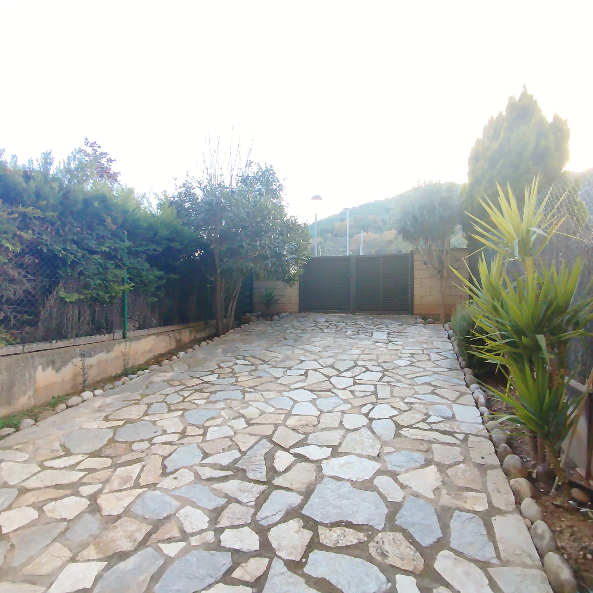 Casa adossada en venda amb jardí