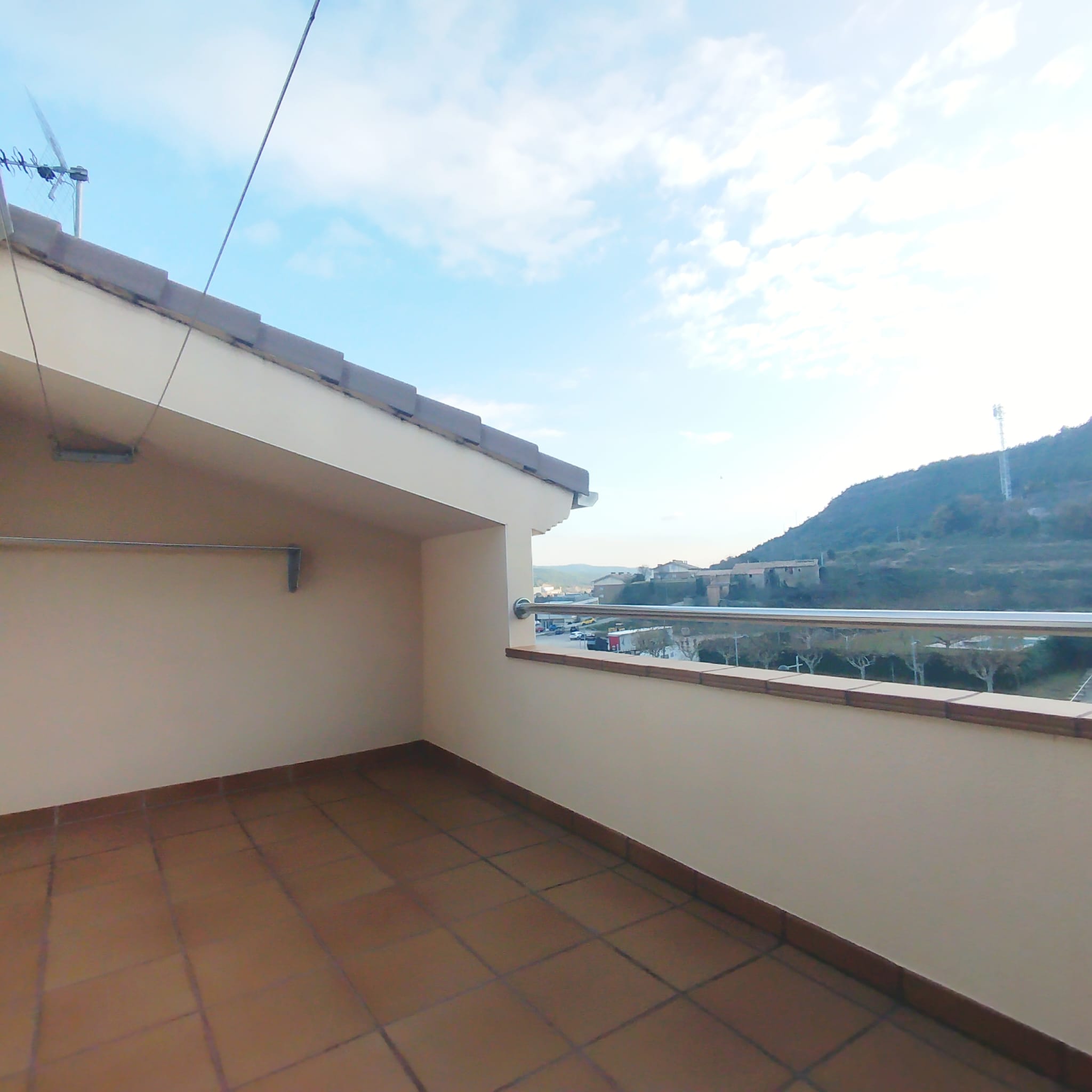 Casa adossada en venda amb jardí