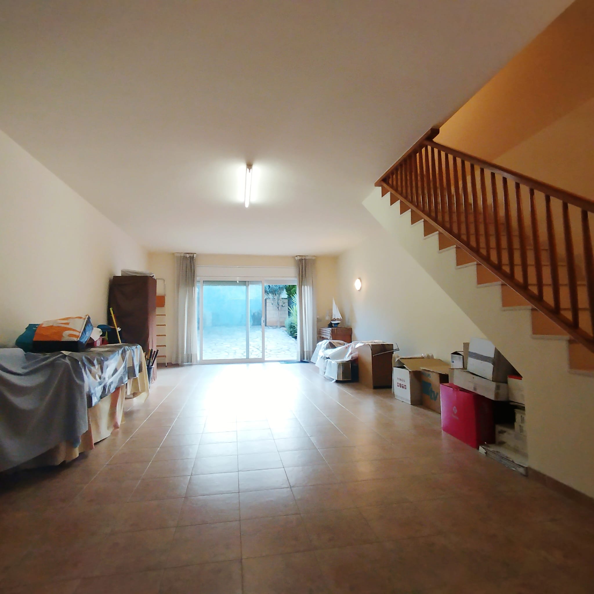 Casa adossada en venda amb jardí