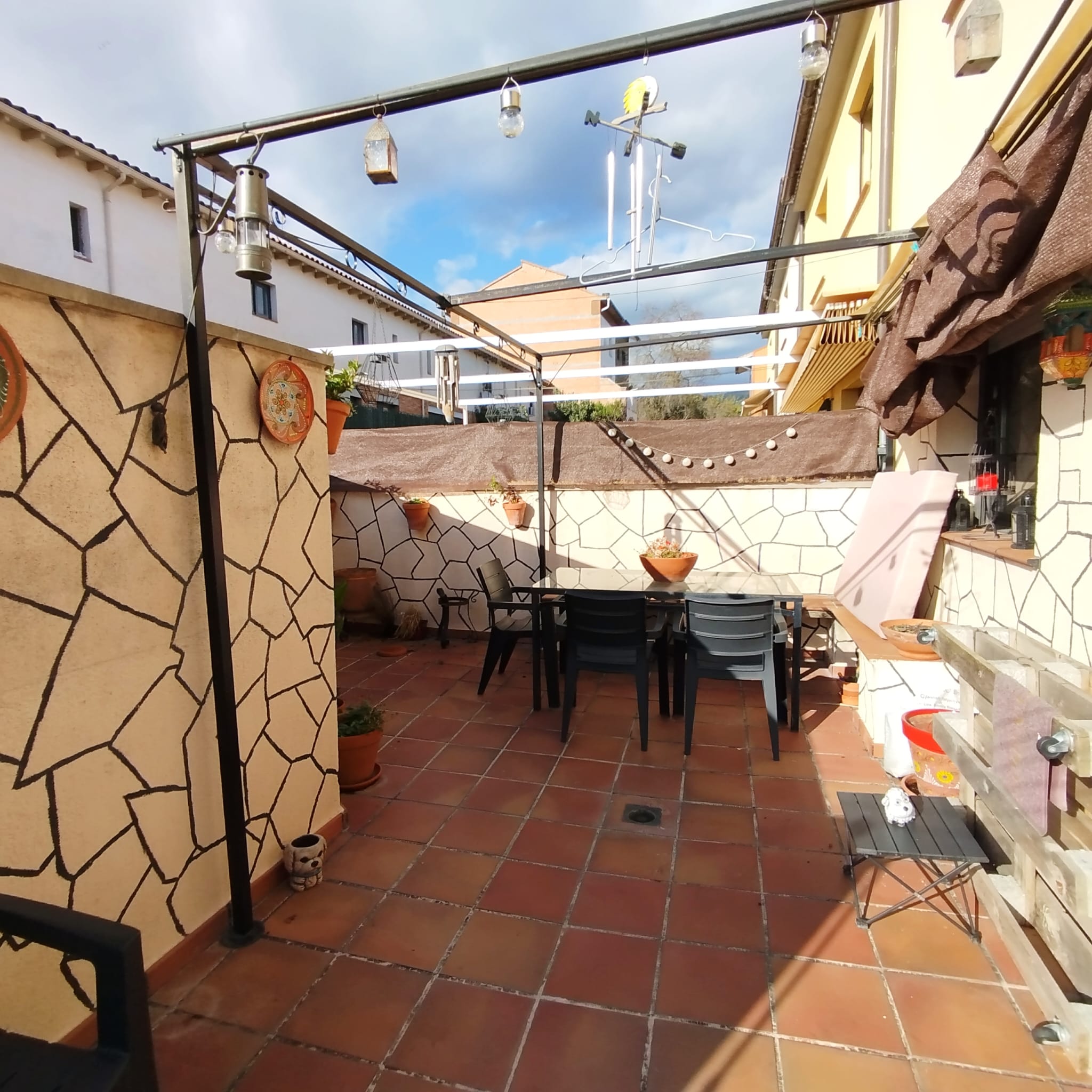 Casa adossada amb terrassa