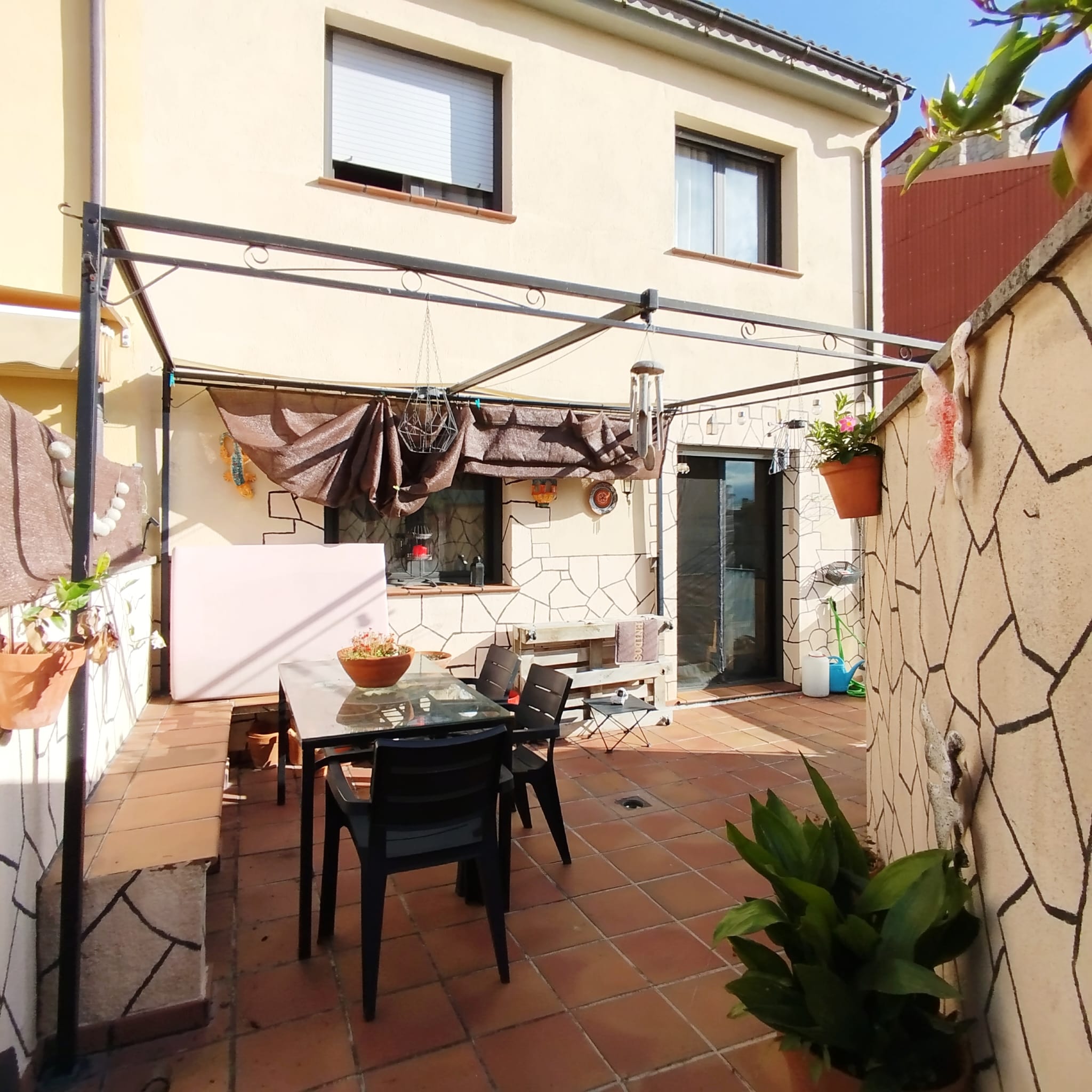 Casa adossada amb terrassa
